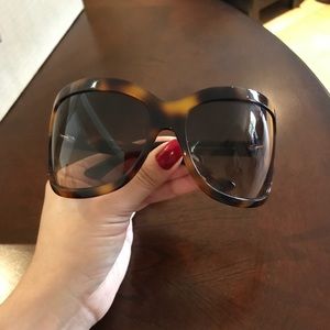 Yves Saint Laurent sunglasses.